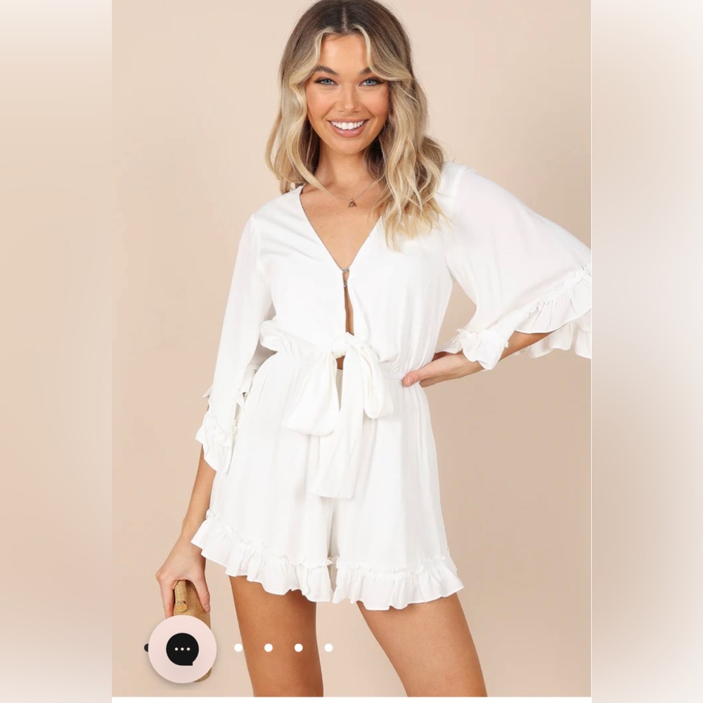 Brand new with tags Tuilly romper  (in unopened plastic)